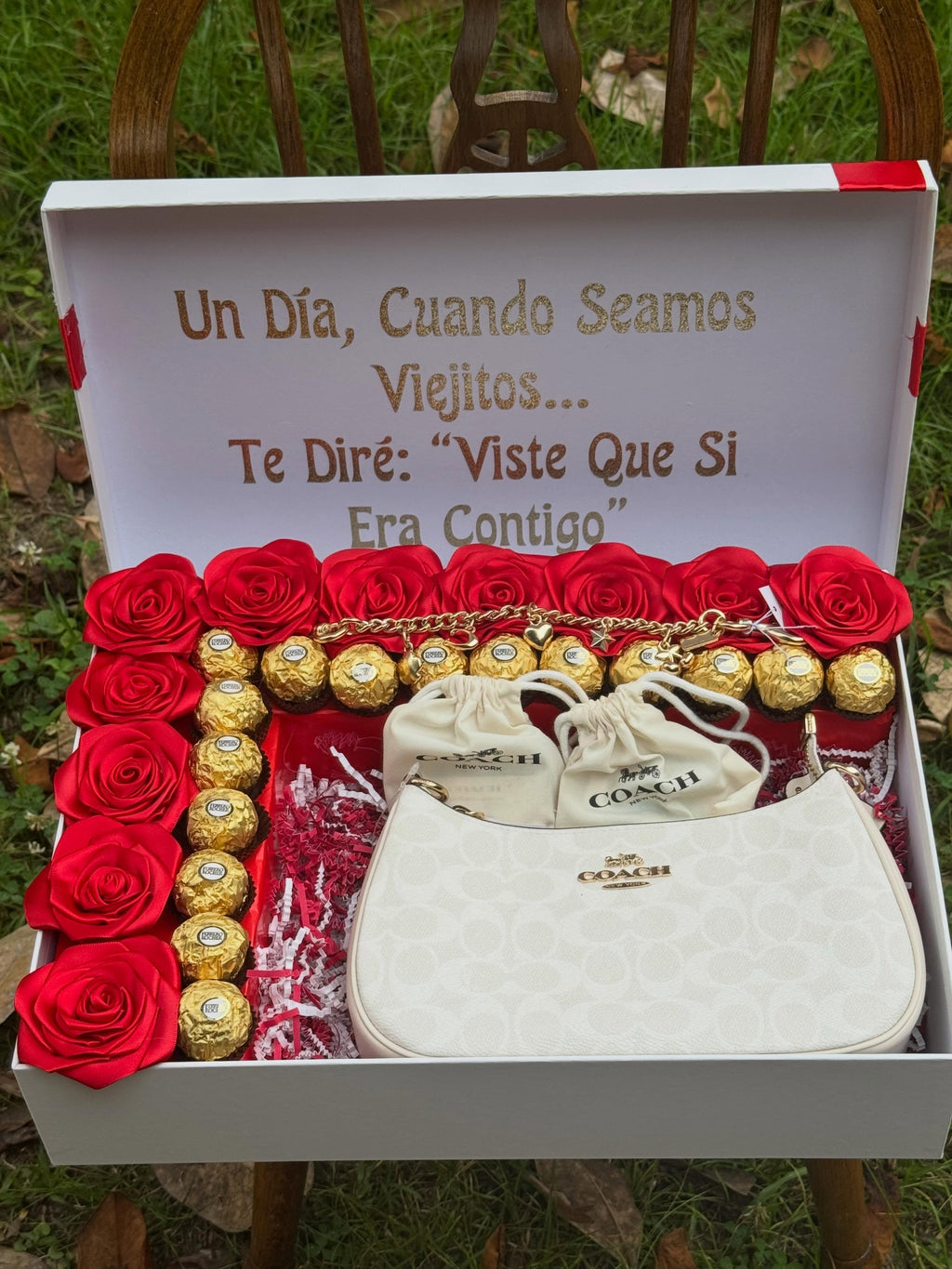 Box with rose and coach bag